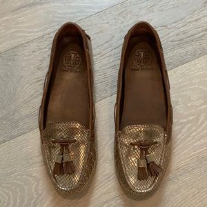 TORY BURCH DRIVING LOAFERS. GOLD, GOLD, GOLD.